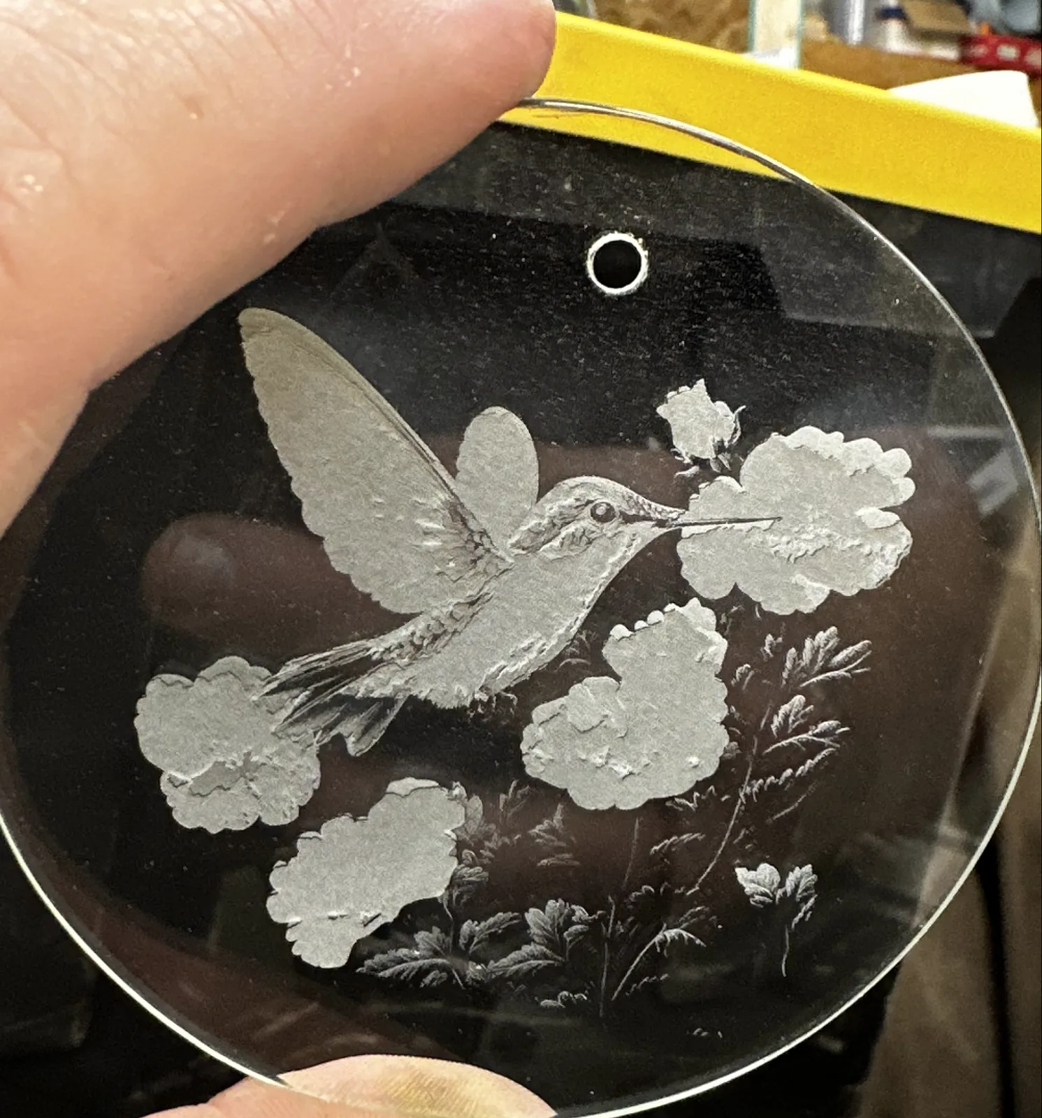 Hummingbird etched into a glass ornament