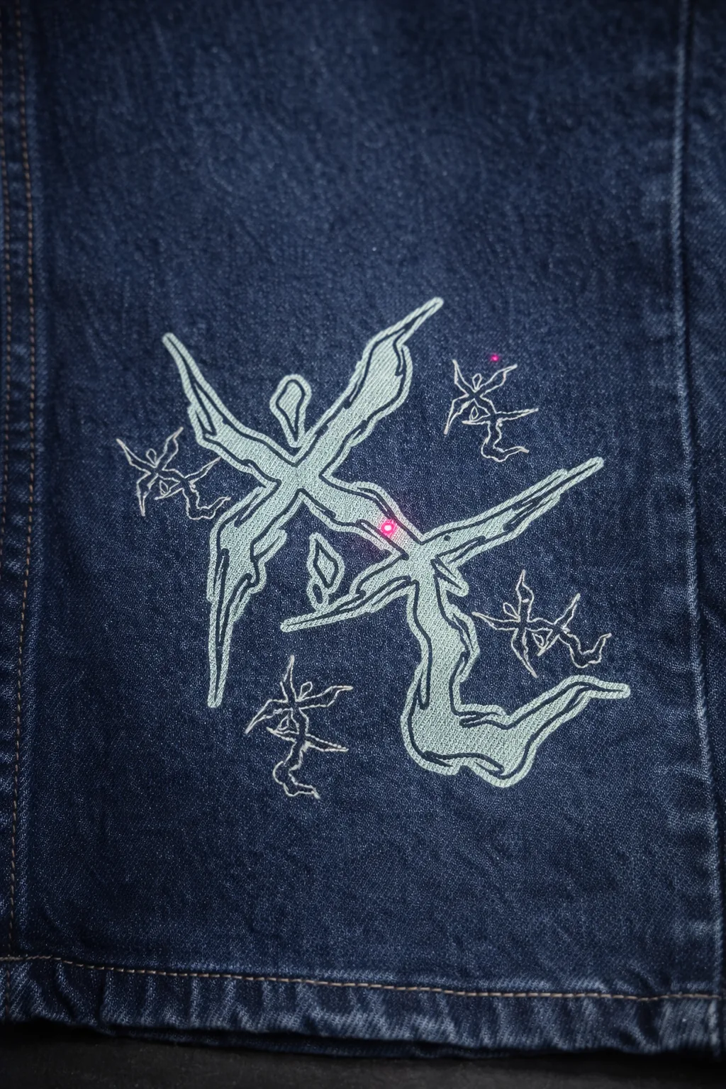 Denim jacket with laser-engraved artwork